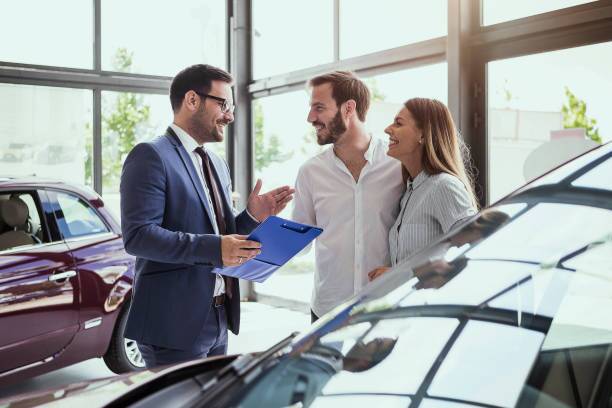 salesman sells car
